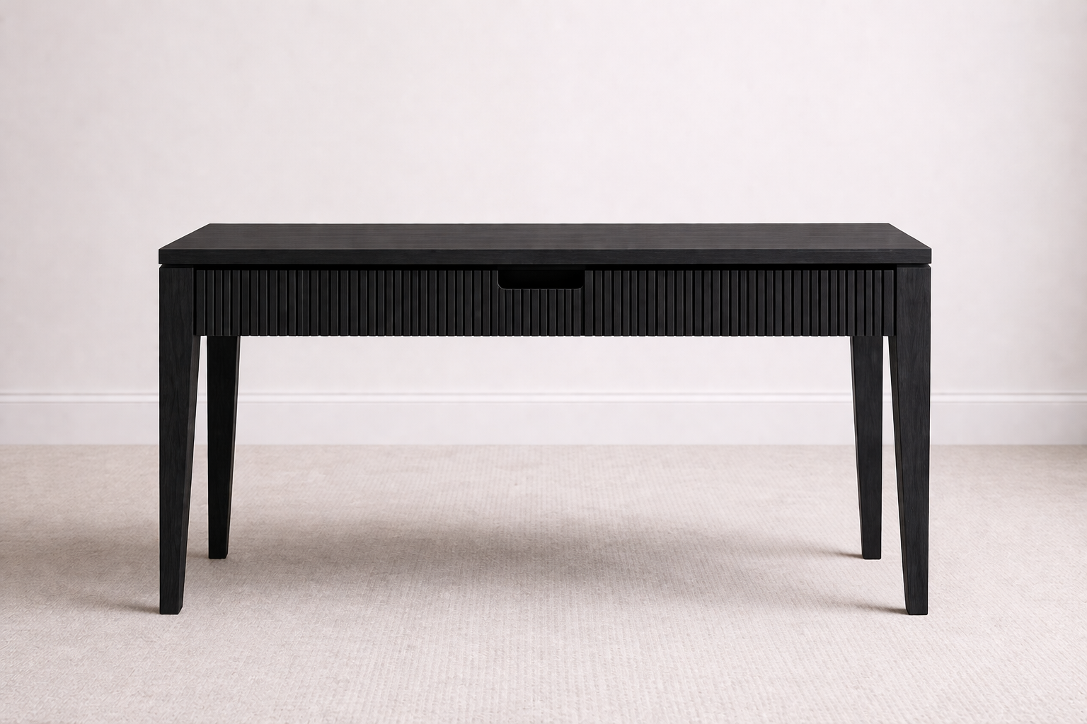 A bespoke desk handcrafted from solid oak with an ebony finish featuring a slat apron, built by a custom furniture maker in Nashville, TN.