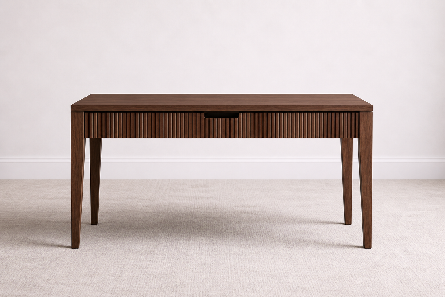 A bespoke desk handcrafted from solid walnut featuring a fluted front, built by a custom furniture maker in Nashville, TN.