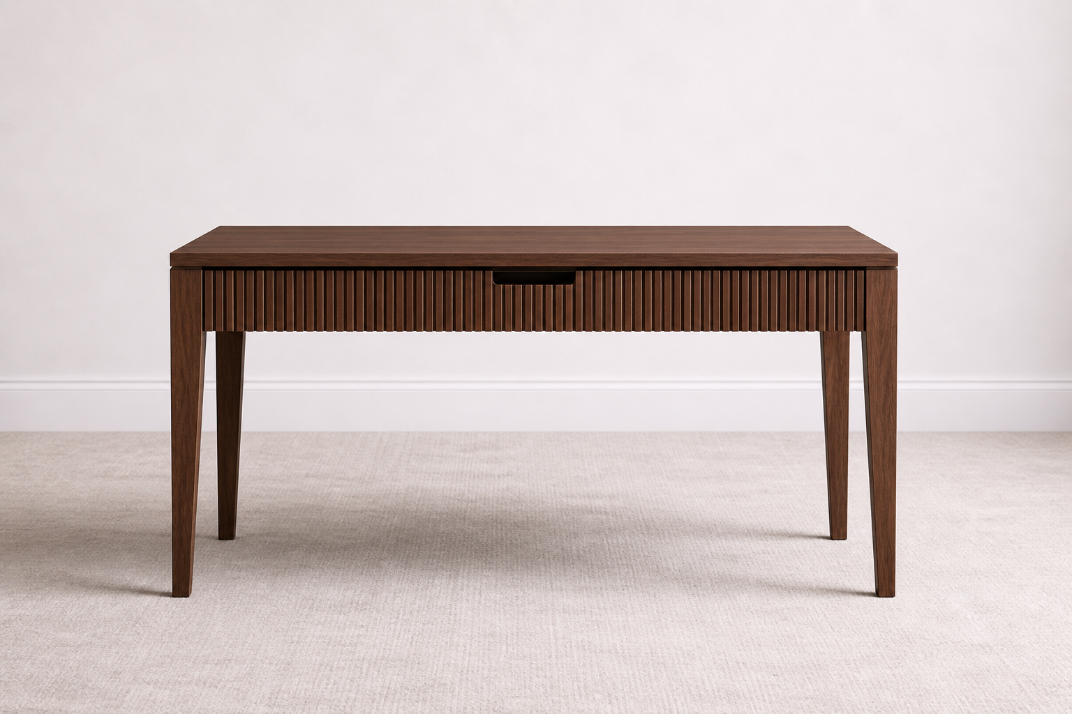 A bespoke desk handcrafted from solid walnut featuring a fluted front, built by a custom furniture maker in Nashville, TN.
