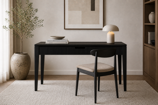 A bespoke desk handcrafted from solid oak with an ebony finish featuring a fluted front, built by a custom furniture maker in Nashville, TN.