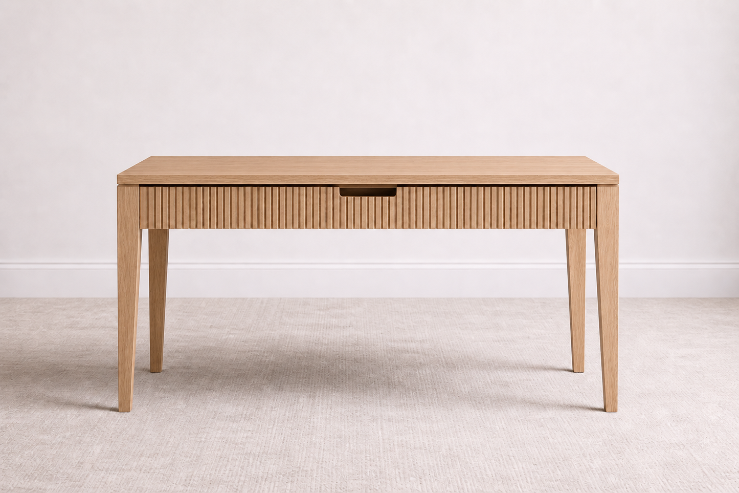 A bespoke desk handcrafted from solid white oak featuring a fluted front, built by a custom furniture maker in Nashville, TN.