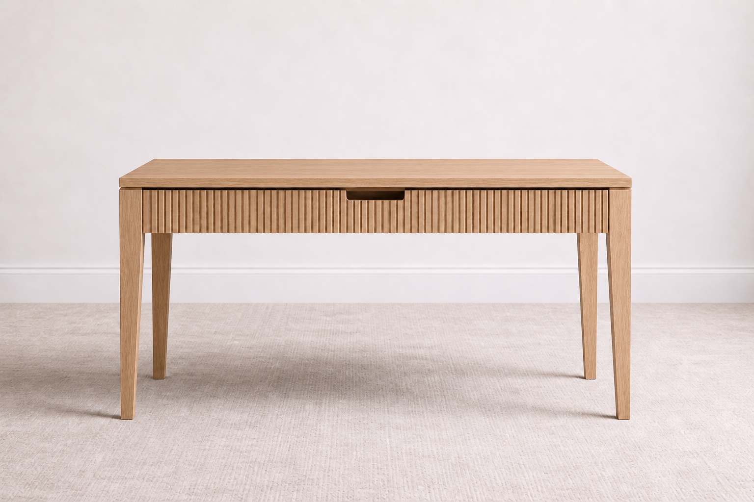 A bespoke desk handcrafted from solid white oak featuring a fluted front, built by a custom furniture maker in Nashville, TN.