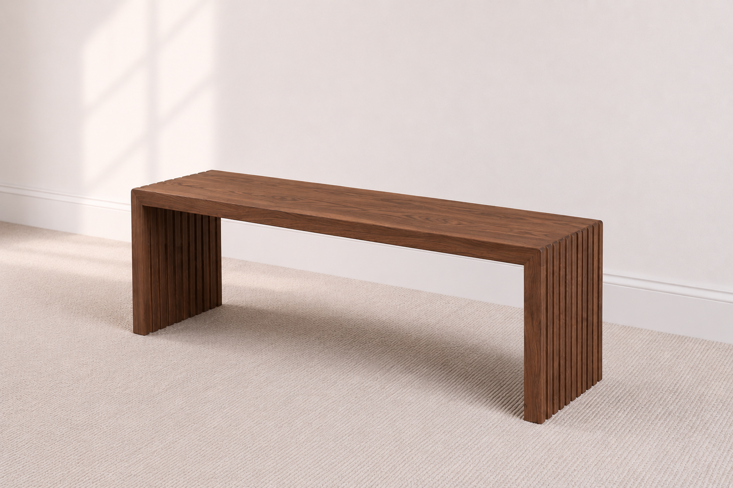 A modern bench handcrafted from solid walnut featuring fluted legs built by a custom furniture maker in Nashville, TN.