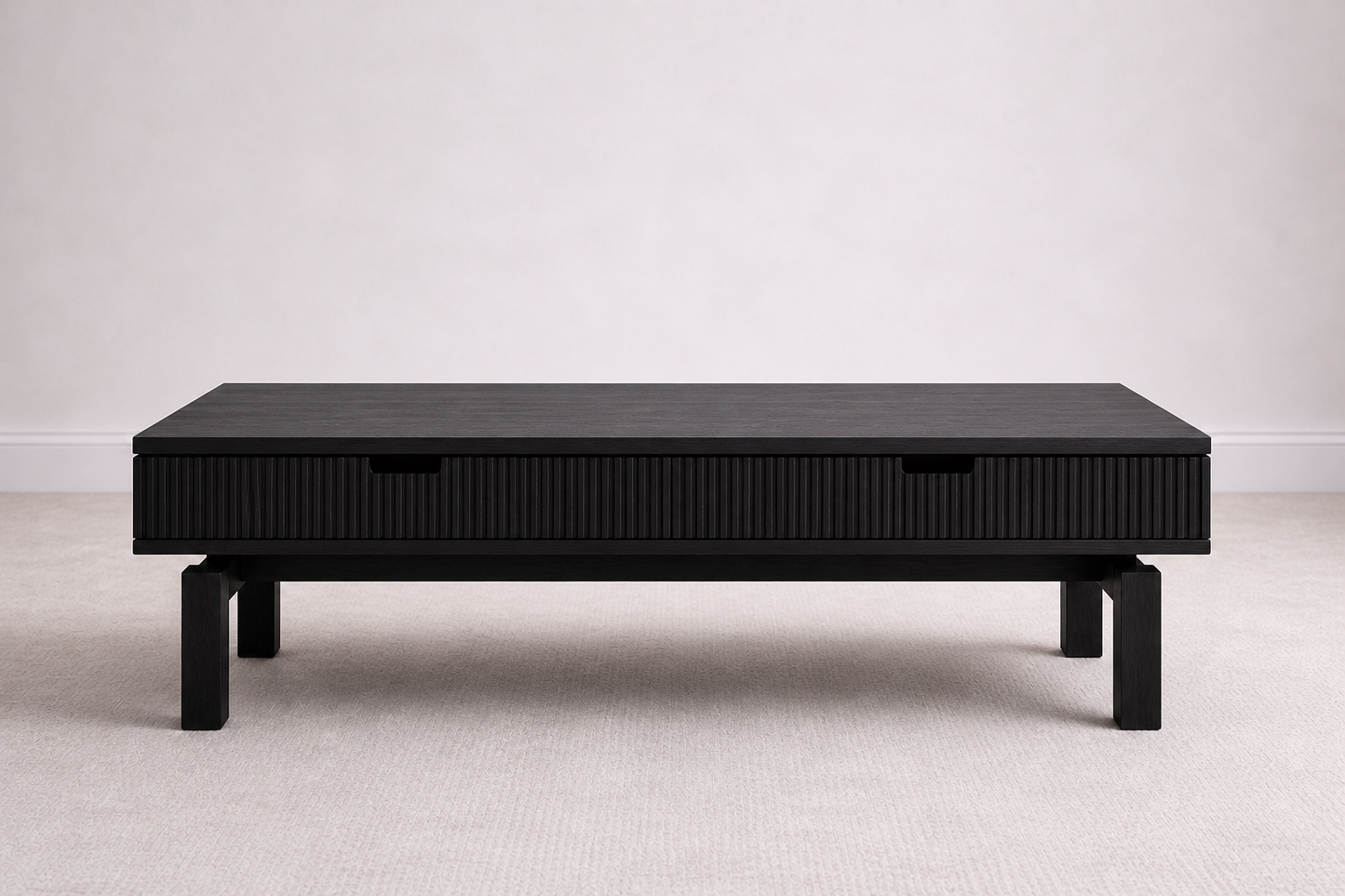 A bespoke coffee table handcrafted from solid oak with an ebony finish featuring a slatted body built by a custom furniture maker in Nashville, TN.