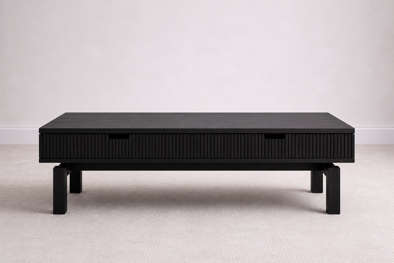 A bespoke coffee table handcrafted from solid oak with an ebony finish featuring a slatted body built by a custom furniture maker in Nashville, TN.