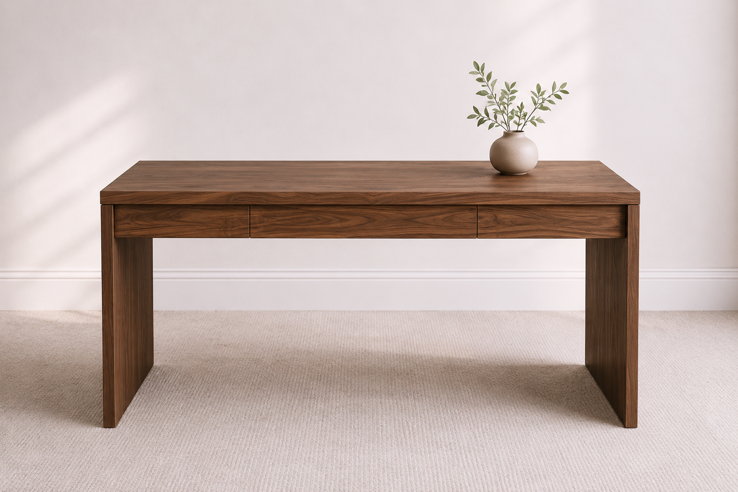 A bespoke desk handcrafted from solid walnut featuring fluted legs, built by a custom furniture maker in Nashville, TN.