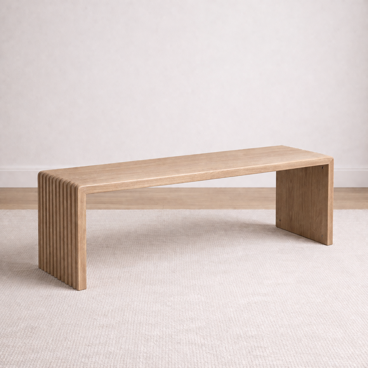 A modern bench handcrafted from solid white oak featuring fluted legs built by a custom furniture maker in Nashville, TN.